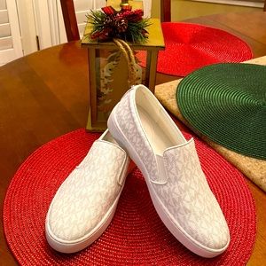 Women’s Michael Kor slip on leather logo Keaton’s.